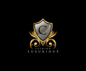 Luxury Golden Shield Logo with C Letter,  royal shield logo icon.
