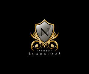 Luxury Golden Shield Logo with N Letter,  royal shield logo icon.
