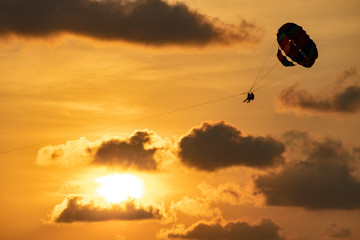 Parasailing during sunset