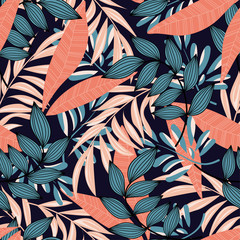 Trending abstract seamless pattern with colorful tropical leaves and plants on blue background. Vector design. Jungle print. Floral background. Printing and textiles. Exotic tropics. Summer.