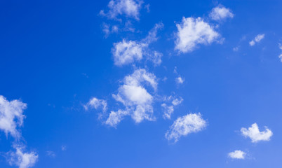 sunny blue sky with white clouds background