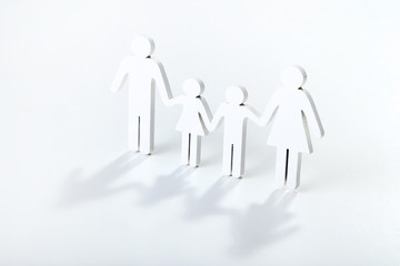 Family figures on grey background