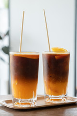Coffee, orange juice, pulp tube