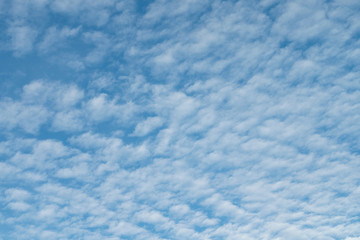 Natural clear blue sky with some clouds for background or backdrop freedom concept