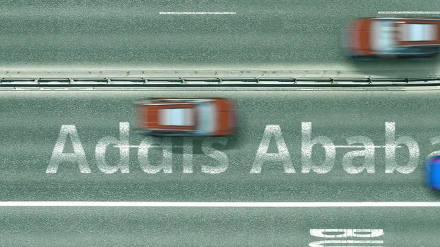 Overhead view of the busy car road with Addis ababa text. Travel to Ethiopia intro clip