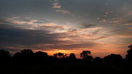 Sunrise or sunset with dramatic clouds