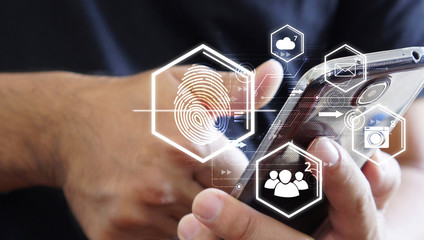 Businessman login with fingerprint scanning technology. fingerprint to identify personal, security...