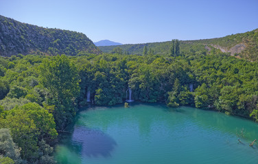 Fototapeta na wymiar Aerial view of the waterfalls on the Brljan lake in canyon of Krka River