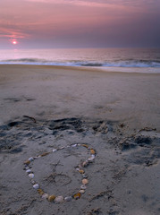 Cape Hatteras sunset with stone heart