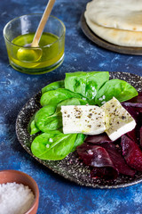 Beetroot, spinach and cheese salad. Healthy eating. Vegetarian food.