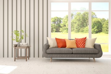 Fototapeta na wymiar Stylish room in white color with sofa and summer landscape in window. Scandinavian interior design. 3D illustration