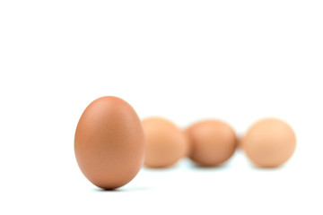 Four brown eggs separated from the white background with spaces for writing text.
