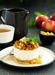 Cheesecake with apples and caramel. New Year's dessert. Selective focus