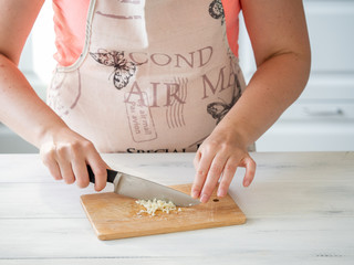 Hands in the frame while cooking
