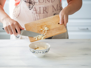 Hands in the frame while cooking