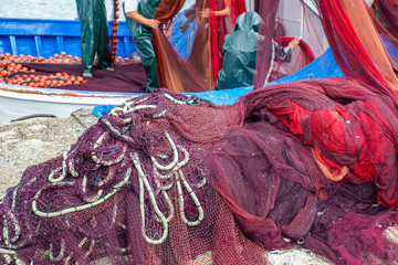 Fototapeta na wymiar Pile of fishing nets on a dock
