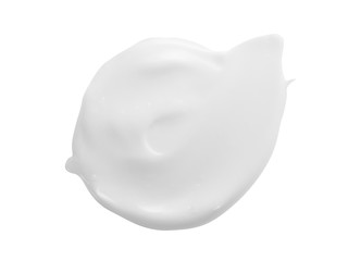 White cream smear isolated on white background. Cosmetic lotion swipe swatch sample. Creamy makeup...