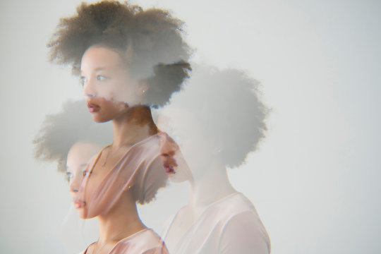 Multiple exposure portrait of a woman in profile
