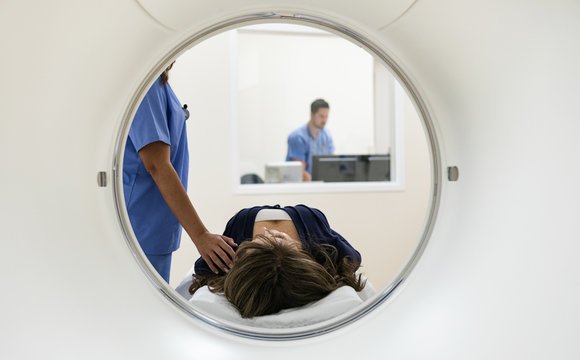 Clinic: Woman Patient Ready For CT Scan