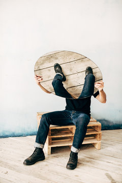 Anonymous man with round mirror