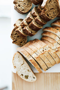 Slices of Cutted Stale Bread on a Chopping Board