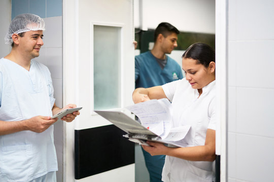 Nurses doing paperwork and reporting