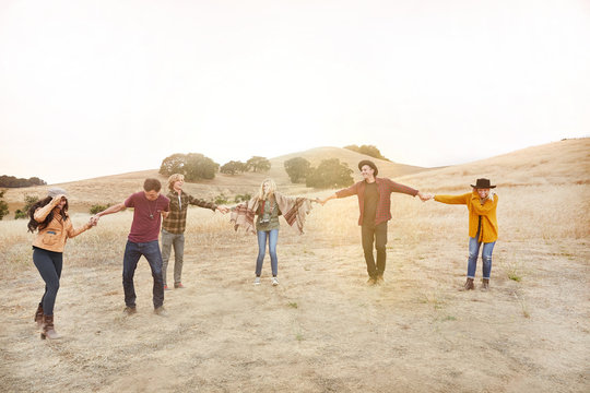 Group of friends doing a human chain together