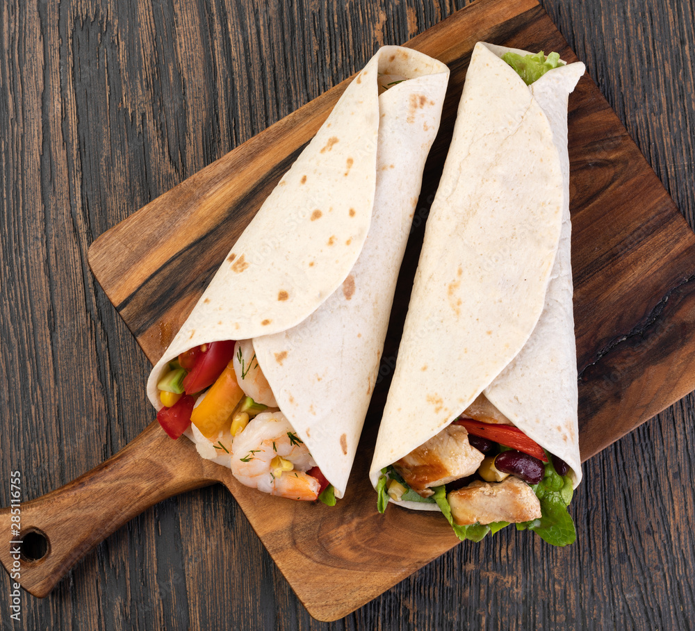 Wall mural burrito with vegetables and tortilla