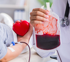 Patient getting blood transfusion in hospital clinic