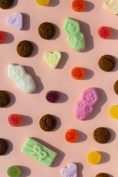 Dutch traditional Sinterklaas candy on a light salmon background