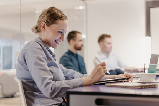 Group of people having a meeting in the modern office