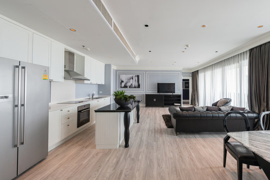 Modern living room and kitchen in small apartment 