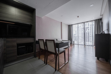 Modern living room and kitchen in small apartment 