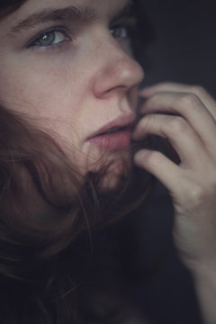 Wistful portrait of a young woman
