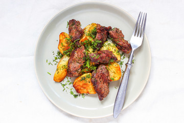 Roasted meat and fried potato with sauce ketchup and mayonnaise