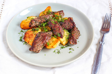 Roasted meat and fried potato with sauce ketchup and mayonnaise
