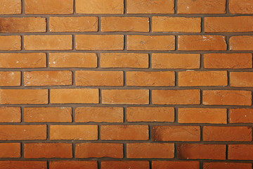 Yellow brick wall. Texture, wallpaper background.