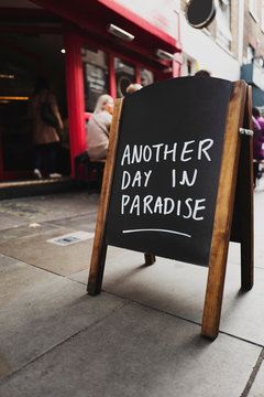 Blackboard says ""Another day in paradise""