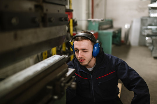 Portrait of a young metal worker