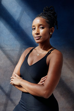 Portrait of a confident athletic strong woman.