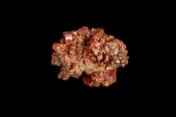 Macro mineral stone Vanadinite on a black background