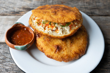 Mexican fried "gorditas" with "chicharron"