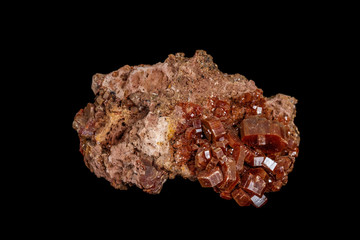 Macro mineral stone Vanadinite on a black background