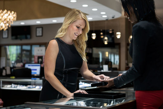 Jewelry: Woman Ring Shopping In Upscale Store