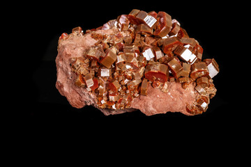 Macro mineral stone Vanadinite on a black background