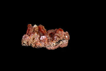 Macro mineral stone Vanadinite on a black background
