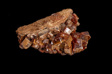 Macro mineral stone Vanadinite on a black background