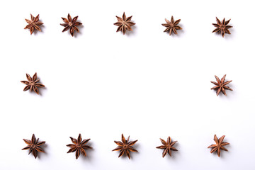 Obraz na płótnie Canvas Star many Anise spice macro, delicious licoricey flavor isolated on the white background