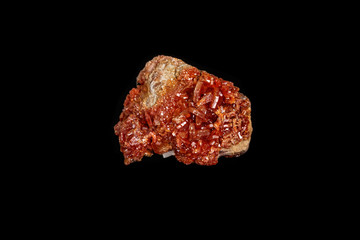 Macro mineral stone Vanadinite on a black background