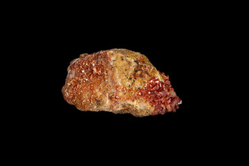 Macro mineral stone Vanadinite on a black background